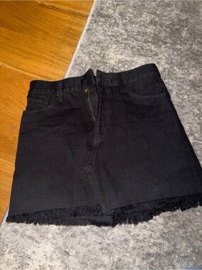 Black denim skirt